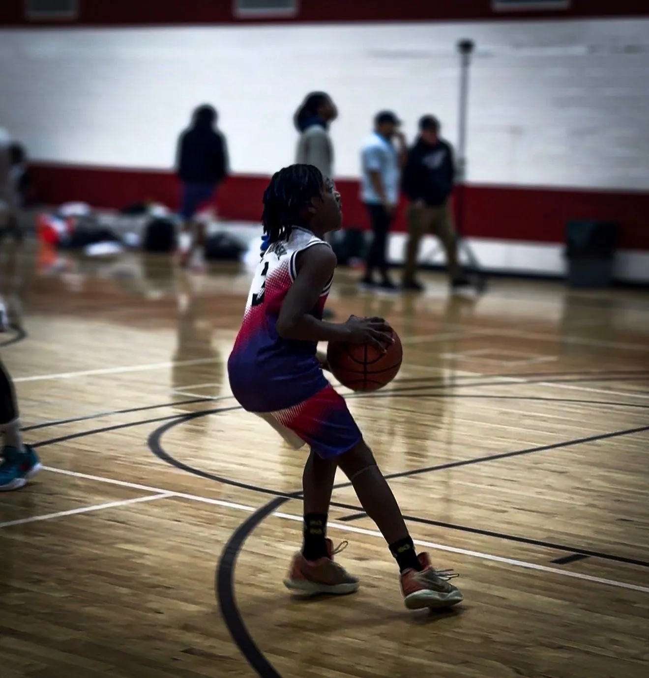 Phenom Elite player works on his shot during gym practice
