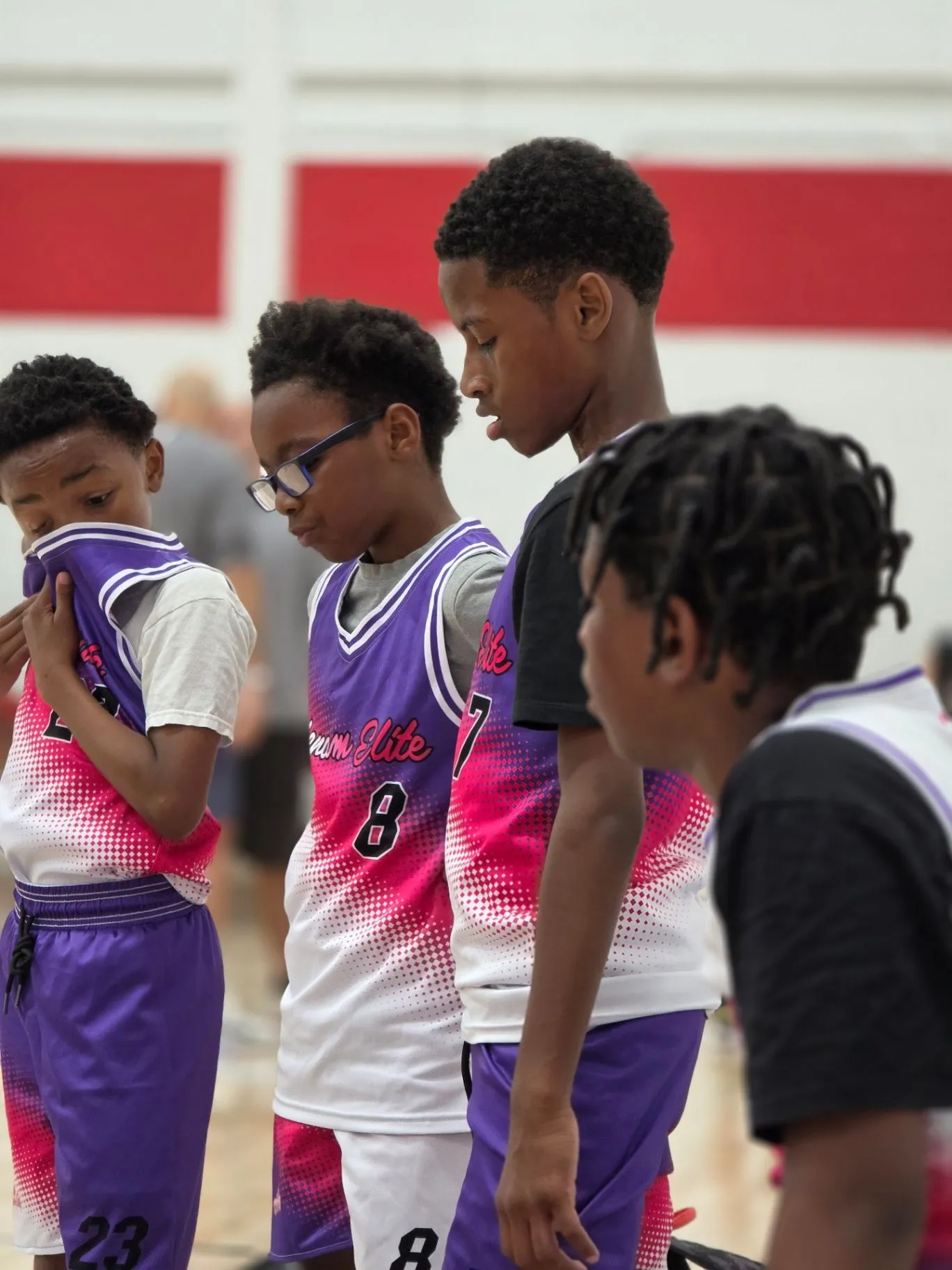 Phenom Elite players gather around their coaches