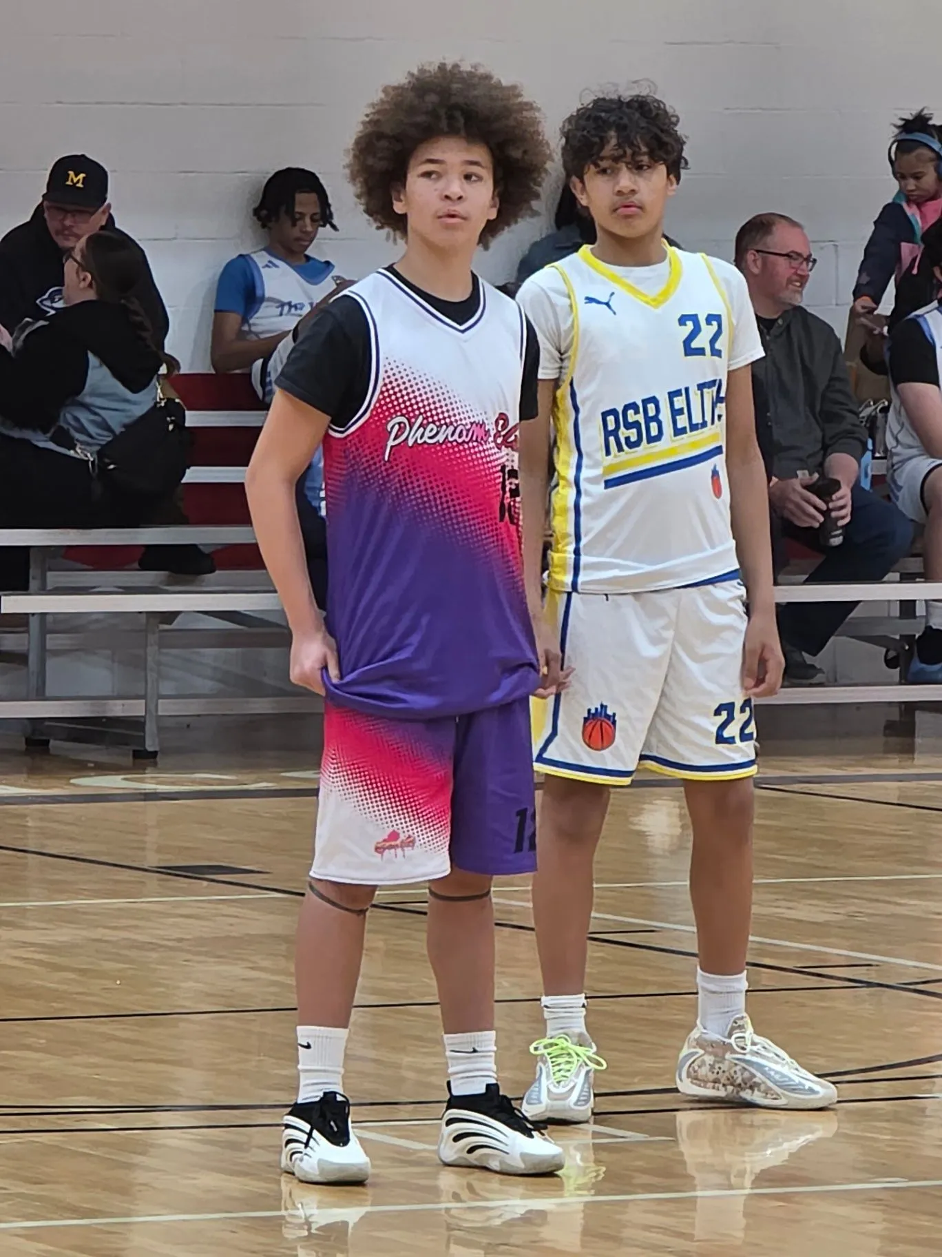 Phenom Elite teammates share a moment after the game